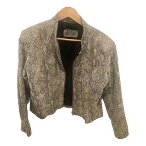 M/L Snake print genuine leather zipped jacket with front pocket.Shoulder padded
